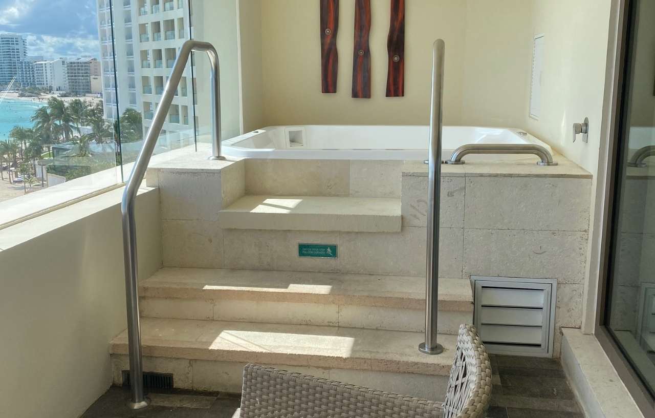Balcony jacuzzi with ocean views at the all-inclusive Hyatt Ziva Cancun corner suite