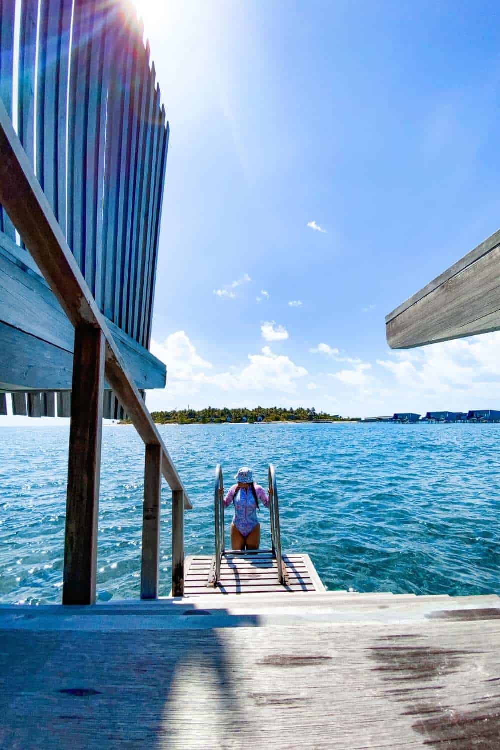 Work with me, Overwater bungalow entrance to ocean at St Regis Maldives Island